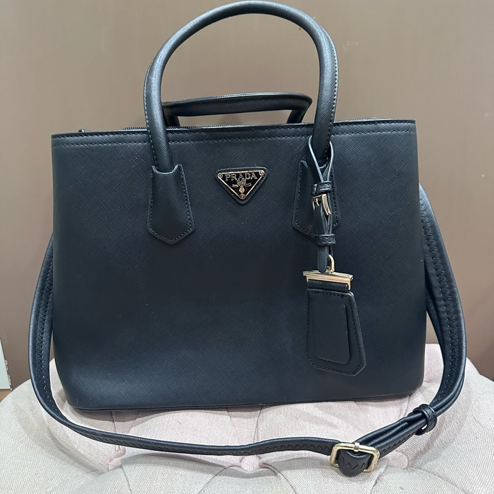 Black handbag with strap